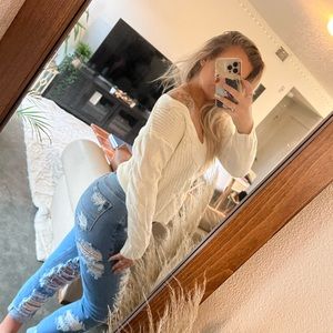 White sweater with cool design in front